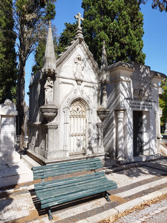 Elegant stone structures and sculptures in the Cemiterio de Prazeres, Lisbon.